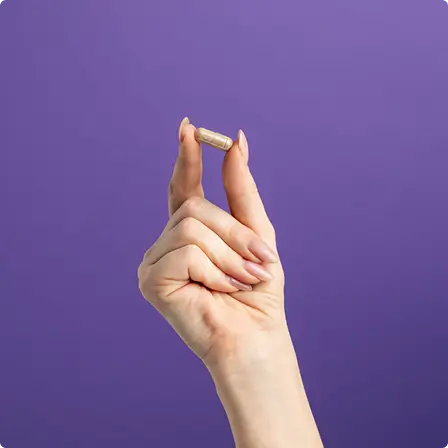 hand-with-pill.6402444e